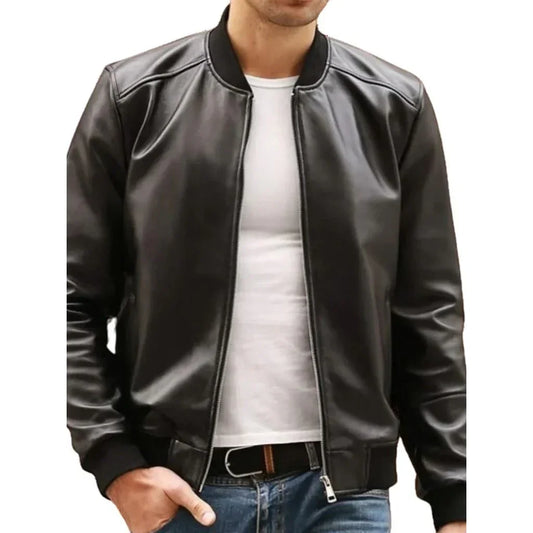 Men's black leather bomber jacket with zip front, worn over white t-shirt and jeans