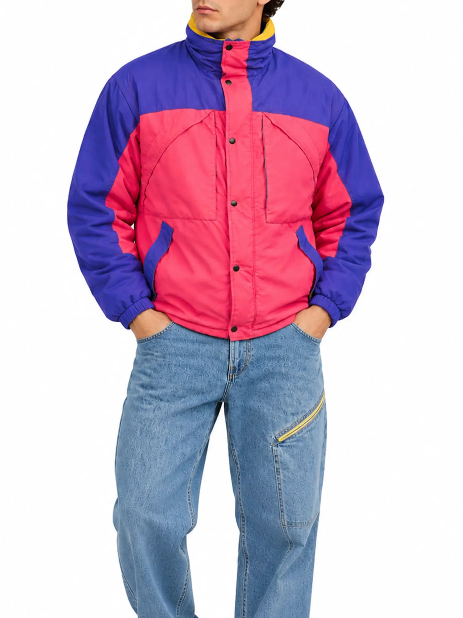 Men's retro purple and pink 90s color-block puffer jacket styled with light-wash jeans on a male model