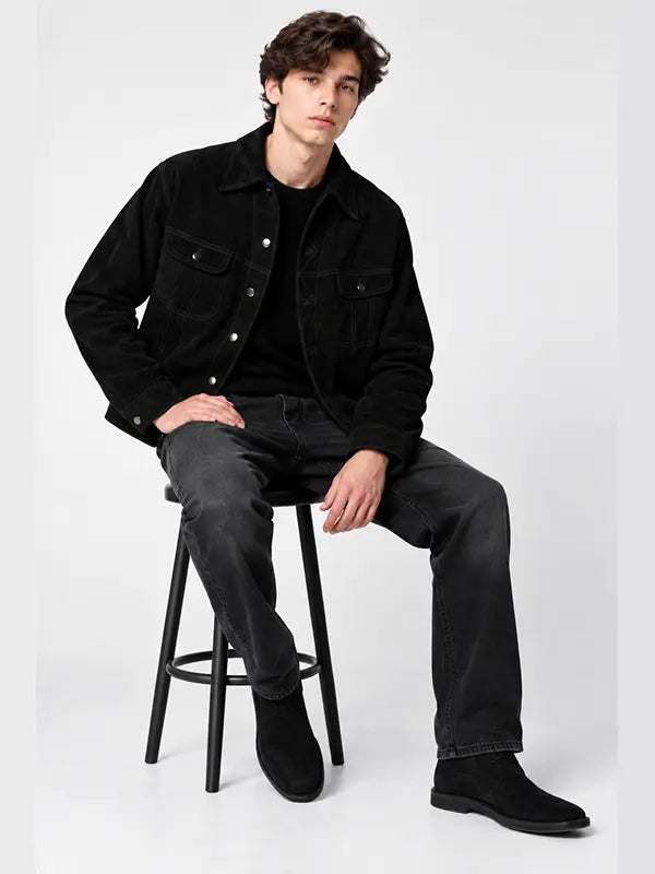Men's black suede trucker jacket with snap buttons and chest flap pockets