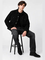 Men's black suede trucker jacket with snap buttons and chest flap pockets