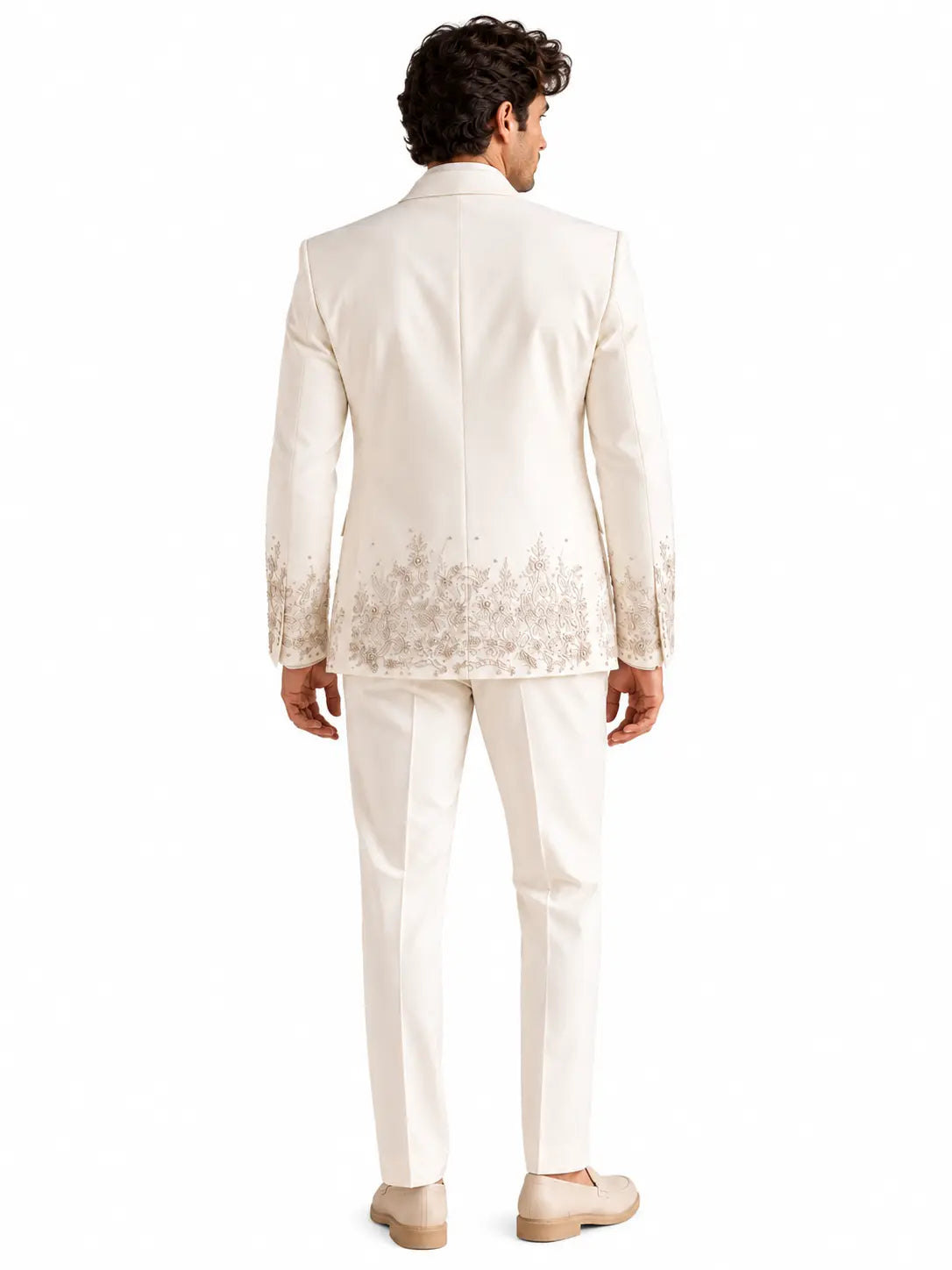 Back view of ivory embroidered luxury men's suit with floral detailing