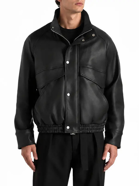 Men's black real leather funnel neck bomber jacket with snap-button front, oversized flap pockets and elasticated waistband.