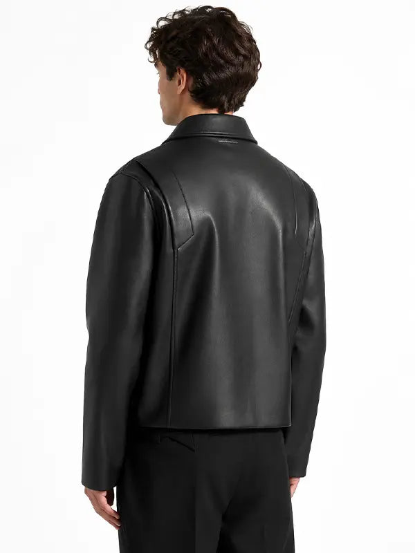 Back view of men's black real leather jacket with smooth leather texture and structured shoulder panel detailing.