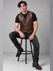 Distressed brown leather biker vest for men with V-neck and front welt pockets