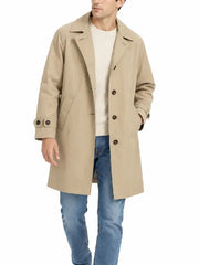 Man wearing a beige mid-length car coat with point collar, button front, and side pockets