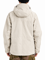Back view of a men's beige waterproof shell jacket with adjustable hood, hook-and-loop cuff tabs and drawcord hem