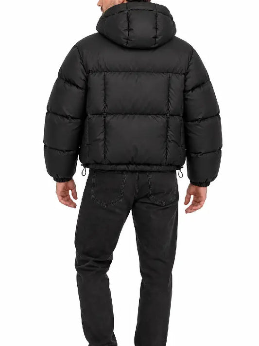 Back view of cropped black hooded puffer jacket showing quilted panels and attached hood