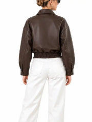 Back view of women's brown cropped leather bomber jacket with elastic hem