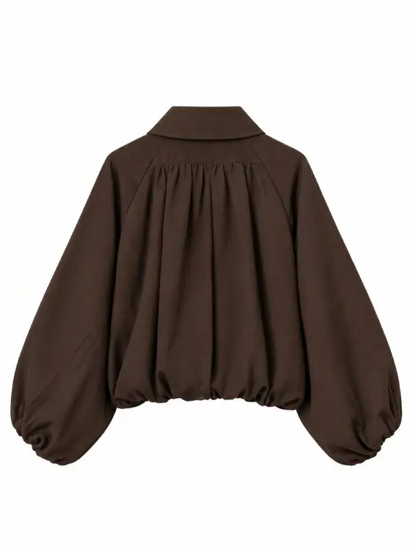 Brown cropped jacket with balloon sleeves, back view showing gathered yoke