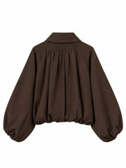 Brown cropped jacket with balloon sleeves, back view showing gathered yoke