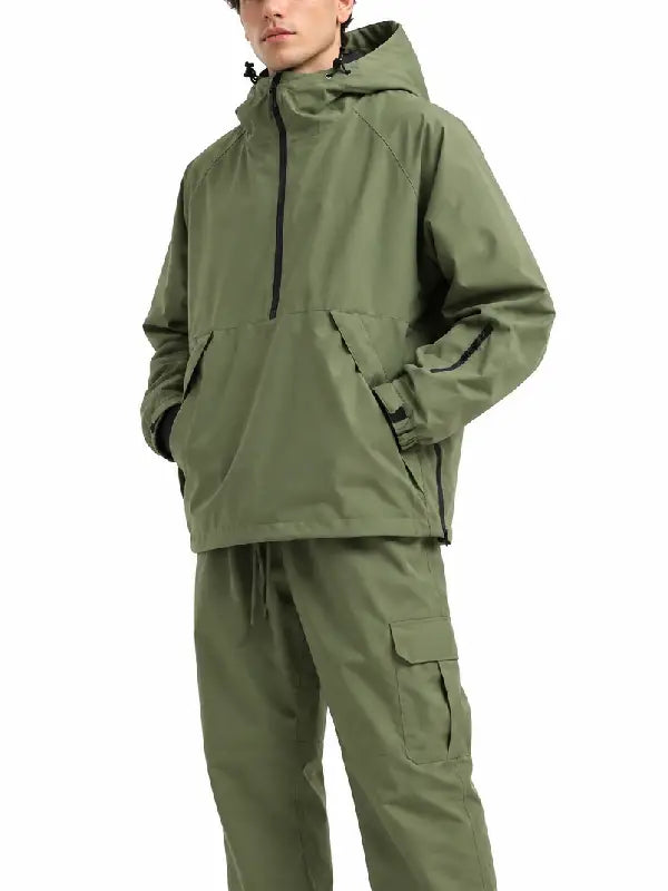 Man wearing an olive green half-zip hooded pullover jacket with angled hand pockets and zippered sleeve pocket