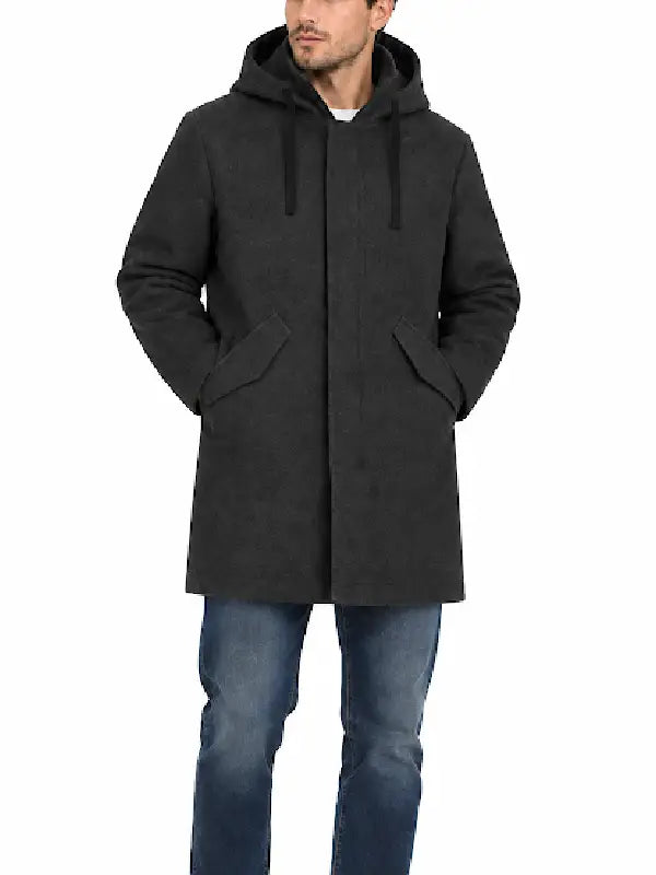 Front view of man wearing charcoal grey hooded wool coat with hands in pockets
