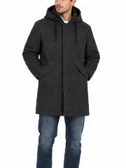 Front view of man wearing charcoal grey hooded wool coat with hands in pockets