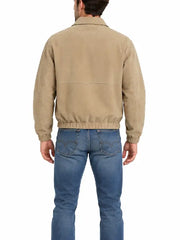 Back view of man wearing khaki suede zip-up jacket with jeans