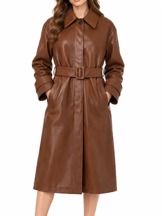 Front view of women’s brown real leather belted trench coat with button front and buckle belt