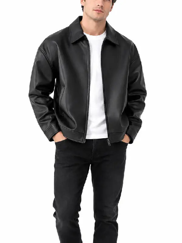 Front view of a man wearing a black zip-front leather jacket over a white t-shirt