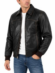 Side angle view of men's black leather jacket showing fit and distressed stitching