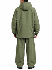 Back view of a men's olive green hooded shell jacket with raglan sleeves, side zippers and elastic cuffs, styled with matching pants
