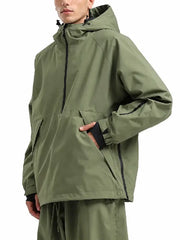 Man wearing an olive green half-zip hooded pullover jacket with angled hand pockets and zippered sleeve pocket