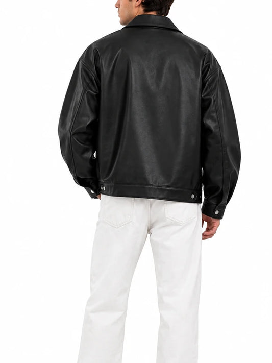 Back view of a men’s oversized black leather bomber jacket with snap button cuffs
