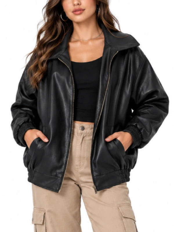 Close-up of women oversized leather bomber jacket with ribbed hem and ribbed cuffs