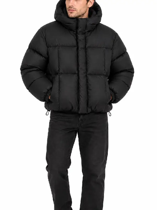 Front view of cropped black hooded puffer jacket with zipped closure and drawstring hem