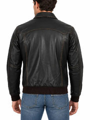 Back view of men's black leather jacket with ribbed hem and cuffs
