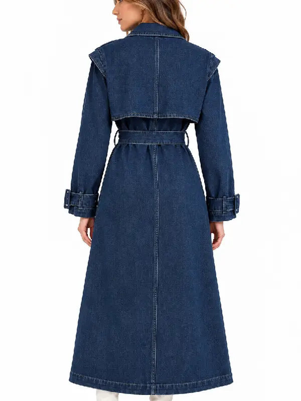 Back view of women's oversized blue denim trench coat with belted waist and dropped shoulders