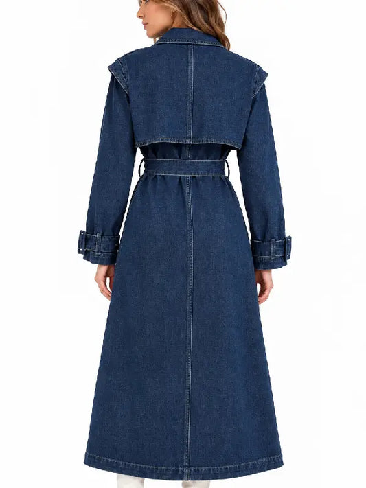 Back view of women's oversized blue denim trench coat with belted waist and dropped shoulders