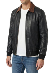 Side angle view of men's black leather bomber jacket with brown collar detail
