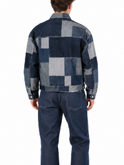 Back view of patchwork denim cropped jacket showing mixed denim wash paneling