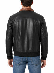 Back view of men's black leather jacket with brown contrast collar and ribbed hem