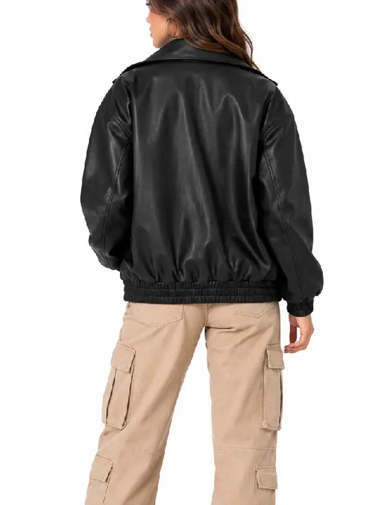 Back view of a women’s oversized black leather bomber jacket with ribbed hem and ribbed cuffs