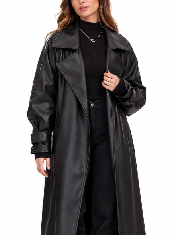 Front close-up of women’s black leather trench coat with notch lapel collar and buckle cuffs