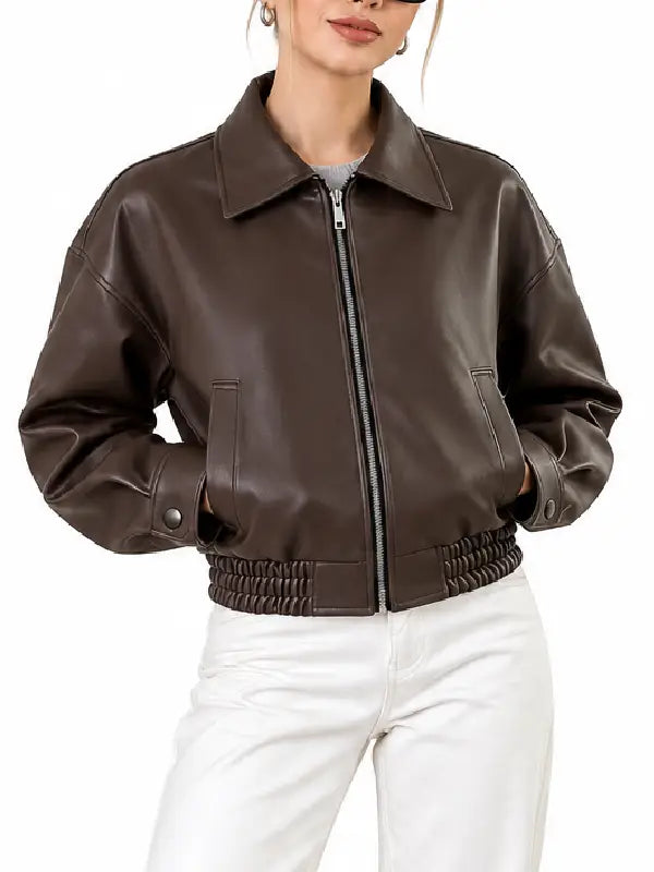 Women's brown leather cropped bomber jacket front view with zipper and collar