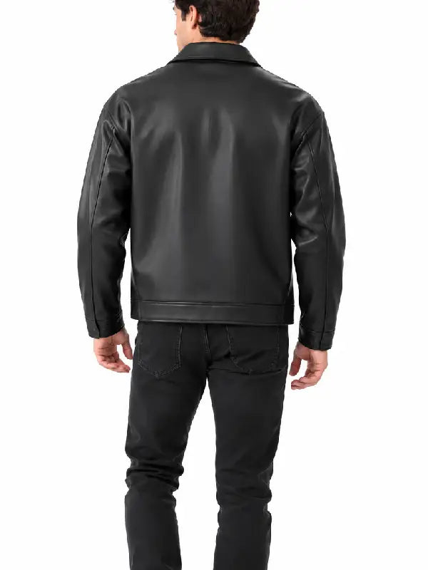 Back view of a man wearing a black real leather jacket with shirt collar and dark jeans